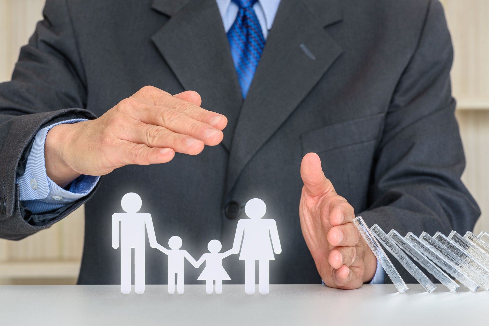 Businessman protects family members e.g parents and two child